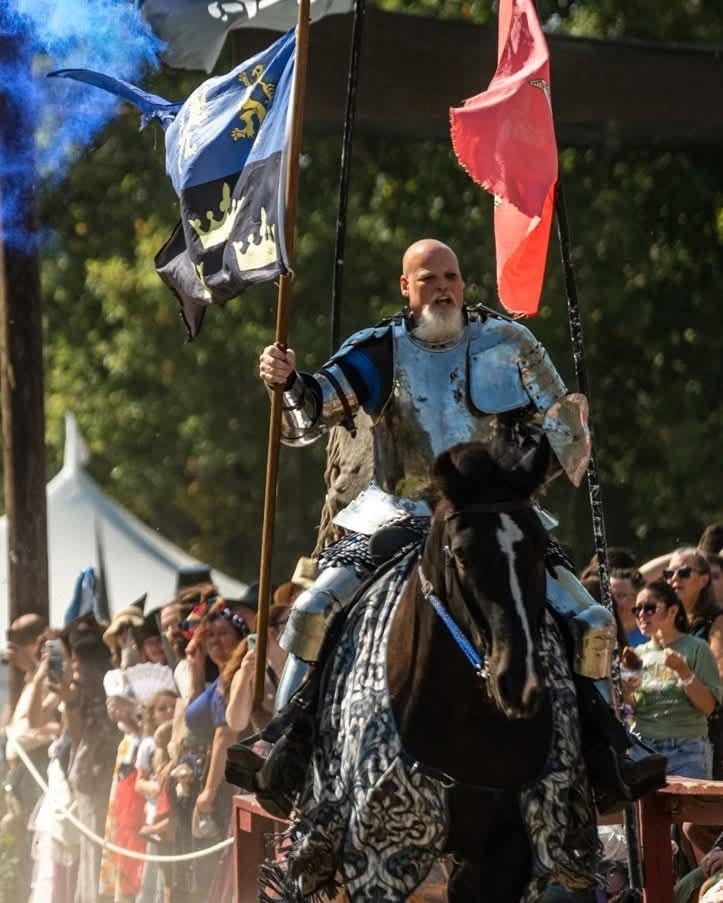 Sir Edward holds his flag in the Knights of the New Order at the Magical Realm Fantasy Faire in Michigan.