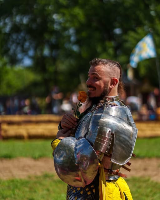 Sir Garr smiles for the crowd as he waits at the Michigan Renaissance Festival