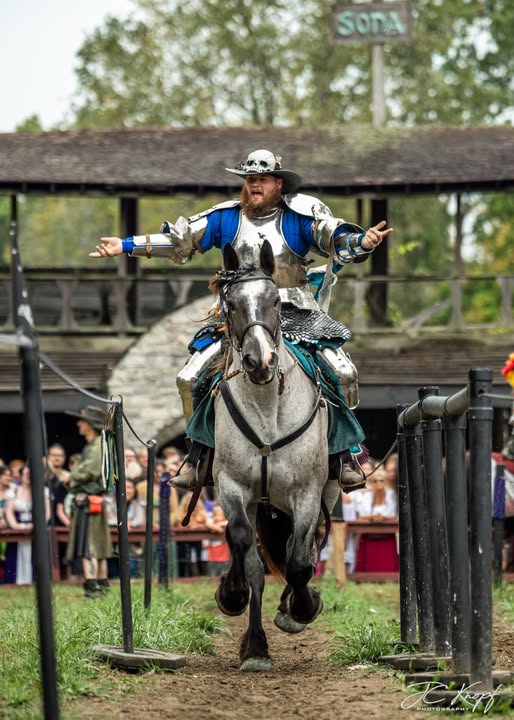 Sir Shiloh encourages the crowds cheers at the Michigan Renaissance Festival.